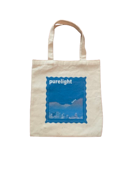 Beige tote bag with blue 'purelight' logo on a white  and navy background